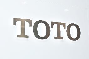 TOTO sign and logo